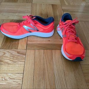 New Balance running shoes. Excellent condition. Neon Orange / pink color.